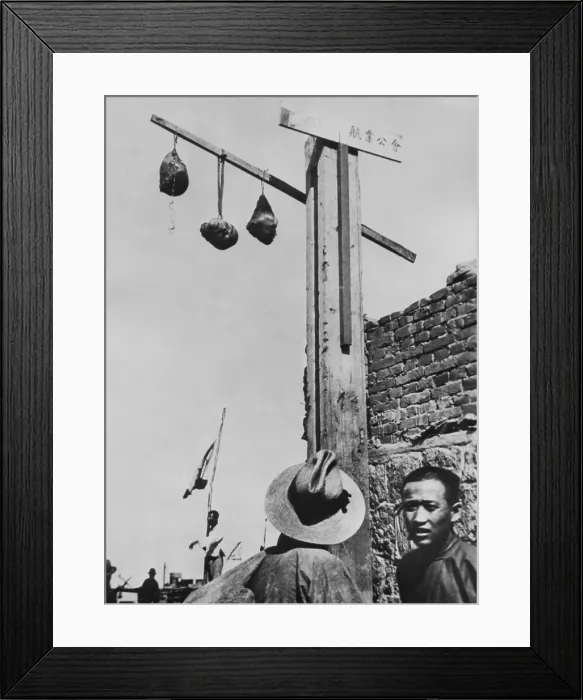 Framed Print : Anti-Japanese Manchurians severed heads displayed in Harbin, Manchukuo