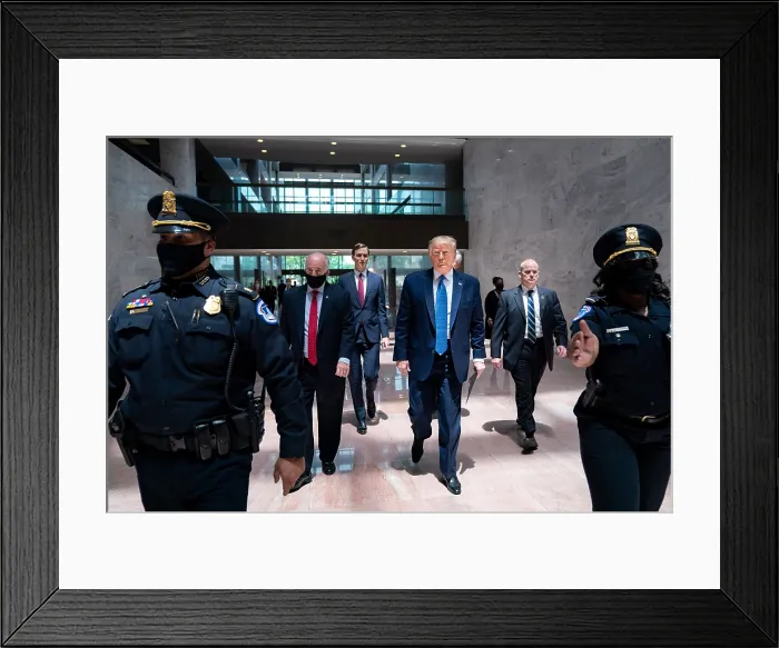 Framed Print : President Donald Trump is escorted by Capital police as he arrives with staff for a Senate Republican election policy luncheon, May 19, 2020 (BSLOC_2020_4_42)