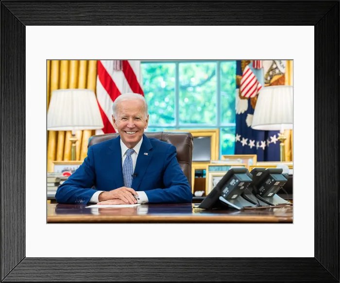 Framed Print : President Joe Biden smiles as he talks on the phone with Finland President Sauli Niinist and Swedish Prime Minister Magdalena Andersson, Aug. 9, 2022