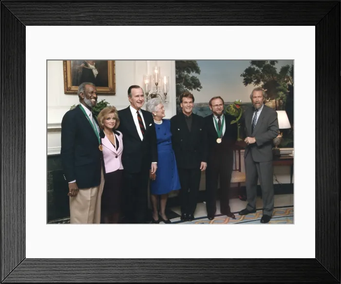 Framed Print : President George H.W. Bush and Barbara Bush, with notable Americans: Wally Amoss, Barbara Mandrell, Patrick Swayze, Ed Castor, Jim Hanson and Kermit the Frog. Feb Framed Print : President George H.W. Bush and Barbara Bush, with notable Americans: Wally Amoss, Barbara Mandrell, Patrick Swayze, Ed Castor, Jim Hanson and Kermit the Frog. Feb