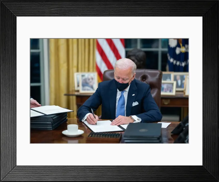 Framed Print : President Joe Biden signs one of 17 Executive Orders waiting for him on Inauguration Day, Jan. 20, 2021