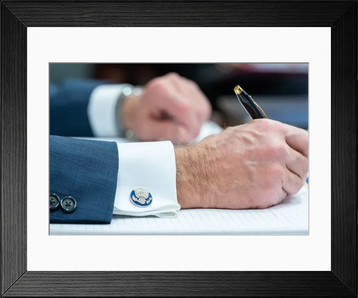 Framed Print : President Joe Bidens hands as he takes notes during a G7 Leaders Virtual Meeting, Feb. 19, 2021, in the White House Situation Room