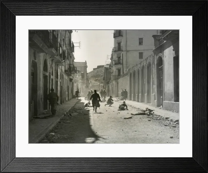 Framed Print : Street fighting in an unidentified Spanish city. It is not known for which side these soldiers are fighting. Spanish Civil War. July 1936-March 1939. (BSLOC_2014_7_45)