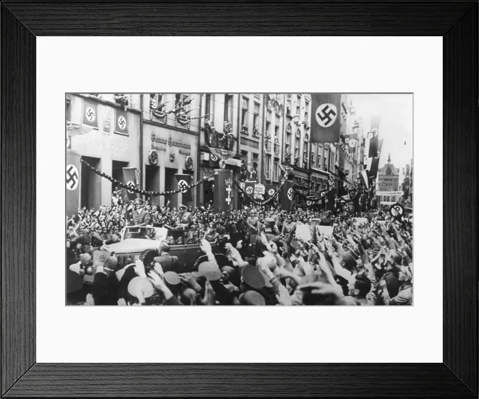 Framed Print : Danzig (Gdansk) greets the Fuhrer on Sept. 19, 1939. German Chancellor, Adolf Hitler receives Nazi Salutes as his rides in victory through Danzig Framed Print : Danzig (Gdansk) greets the Fuhrer on Sept. 19, 1939. German Chancellor, Adolf Hitler receives Nazi Salutes as his rides in victory through Danzig