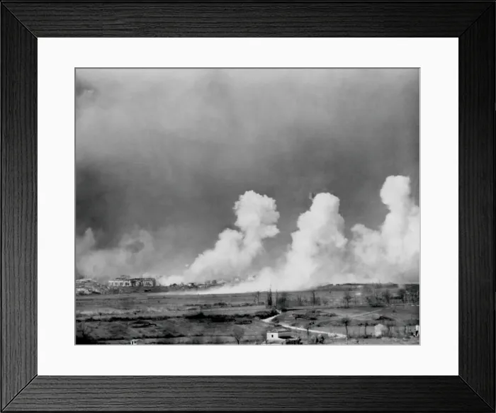 Framed Print : American bombs explode in the town of Cassino, Feb. 15, 1944. The town was completely destroyed but German defenders survived in cellars