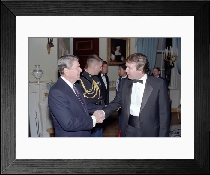 Framed Print : President Ronald Reagan Shaking Hands with Donald Trump at a White House reception for members of Friends of Art and Preservation in Embassies Framed Print : President Ronald Reagan Shaking Hands with Donald Trump at a White House reception for members of Friends of Art and Preservation in Embassies