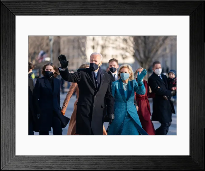 Framed Print : President Joe Biden and First Lady Jill Biden wave as they walk along Pennsylvania Ave. to the White House during the inaugural parade, Jan. 20, 2021 (BSLOC_2021_4_8)