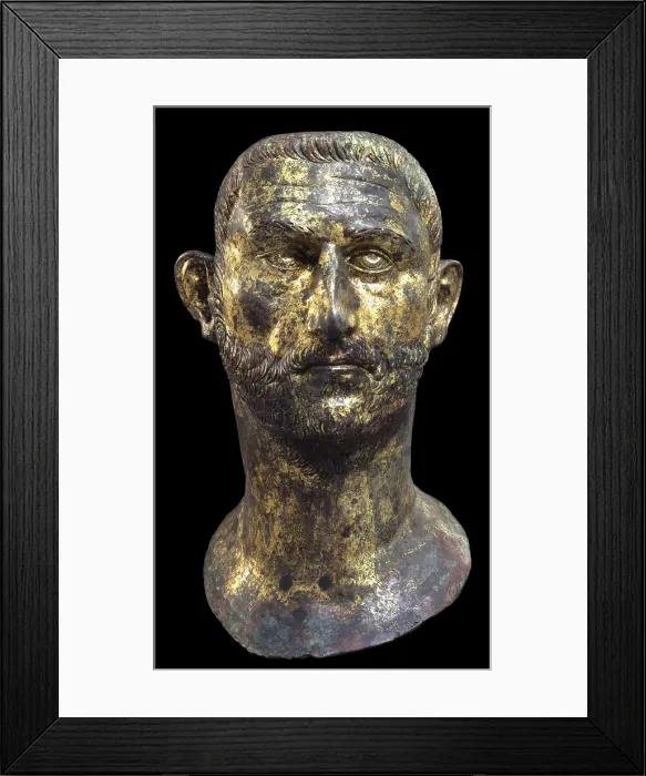 Framed Print : Portrait of Probus, 3rd Century, gilded bronze - Italy, Lombardy, Brescia, Museo Civico di Santa Giulia. Whole artwork view. Male portrait of the emperor Probo