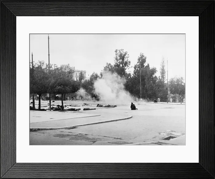 Framed Print : Athens Police fire shots at demonstrators. Some protesters lay on the ground while others run during political violence in liberated Athens. Dec. 18, 1944. - (BSLOC_2014_15_218)