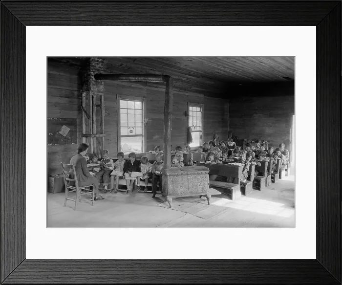 Framed Print : One room school with 28 students of various ages. Bare room lacks educational equipment and is heated by a wood stove. Oakdale School near Loyston, Tennessee. Oct. 1930