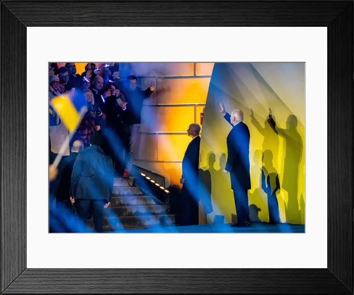 Framed Print : Bathed in yellow and blue light, the colors of the Ukrainian flag, President Joe Biden waves to the crowds of 30, 000 at the Royal Castle Warsaw, Poland, Feb Framed Print : Bathed in yellow and blue light, the colors of the Ukrainian flag, President Joe Biden waves to the crowds of 30, 000 at the Royal Castle Warsaw, Poland, Feb