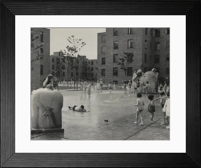 Framed Print : Children playing in courtyard fountains of the Jane Addams Homes housing project. The Chicago apartments were built in 1938 by Franklin D. Roosevelt's WPA Program Framed Print : Children playing in courtyard fountains of the Jane Addams Homes housing project. The Chicago apartments were built in 1938 by Franklin D. Roosevelt's WPA Program