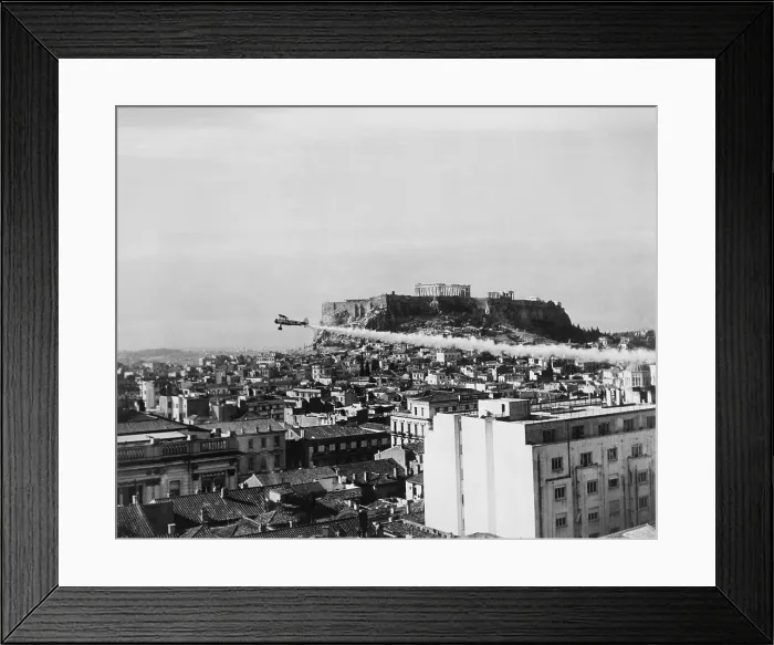 Framed Print : A plane dusts the ancient city of Athens with DDT prevent the spread of cholera in Greece from Egypt. The DDT was intended to kills flies associated with the disease's spread
