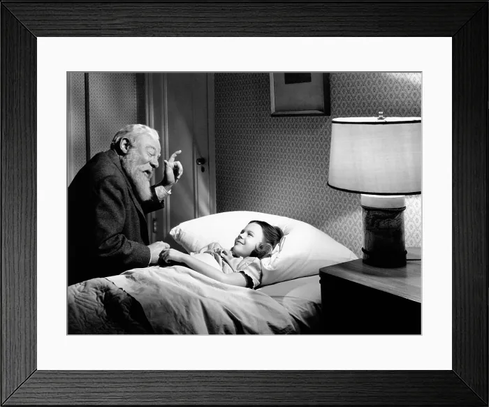 Framed Print : MIRACLE ON 34TH STREET, from left, Edmund Gwenn, Natalie Wood, 1947, TM and copyright 20th Century Fox Film Corp. All rights reserved / Courtesy: Everett Collection Framed Print : MIRACLE ON 34TH STREET, from left, Edmund Gwenn, Natalie Wood, 1947, TM and copyright 20th Century Fox Film Corp. All rights reserved / Courtesy: Everett Collection