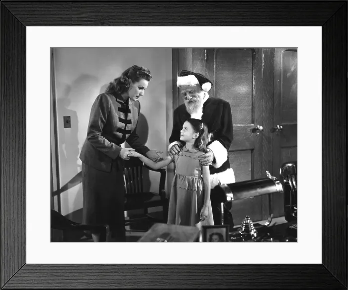 Framed Print : MIRACLE ON 34TH STREET, Maureen O'Hara, Edmund Gwenn, Natalie Wood, 1947, TM and Copyright (c) 20th Century-Fox Film Corp. All Rights Reserved Framed Print : MIRACLE ON 34TH STREET, Maureen O'Hara, Edmund Gwenn, Natalie Wood, 1947, TM and Copyright (c) 20th Century-Fox Film Corp. All Rights Reserved