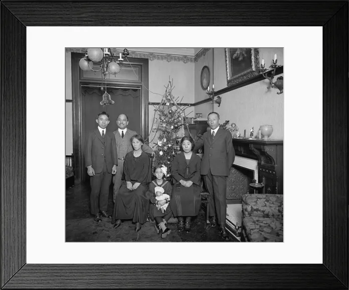 Framed Print : East Asian family with Christmas tree in their home in Washington, D.C. in 1921-22. The well-dressed group are in a spacious nicely furnished apartment (BSLOC_2016_8_91)