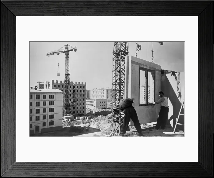 Framed Print : Construction workers building an eighty unit apartment building, Moscow, Russia. Workers from N Framed Print : Construction workers building an eighty unit apartment building, Moscow, Russia. Workers from N