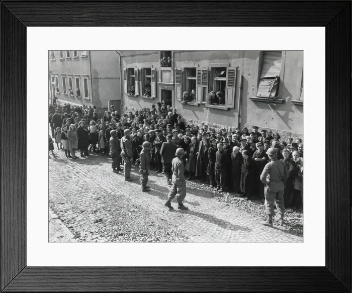 Framed Print : Civilians of Ensheim, Germany, defied of Hitler's orders to join the Nazi resistance. Instead, they were taken into safe temporary evacuation by the Seventh Army troops