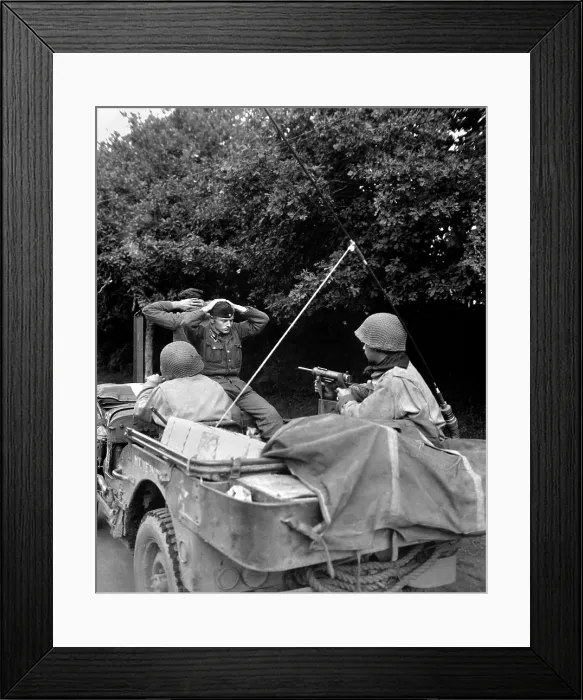 Framed Print : Two German prisoners guarded by the Free French Infantry of the 6th Armored Div. Plouay, Brittany, France. August 28, 1944. World War 2. (BSLOC_2014_8_92)