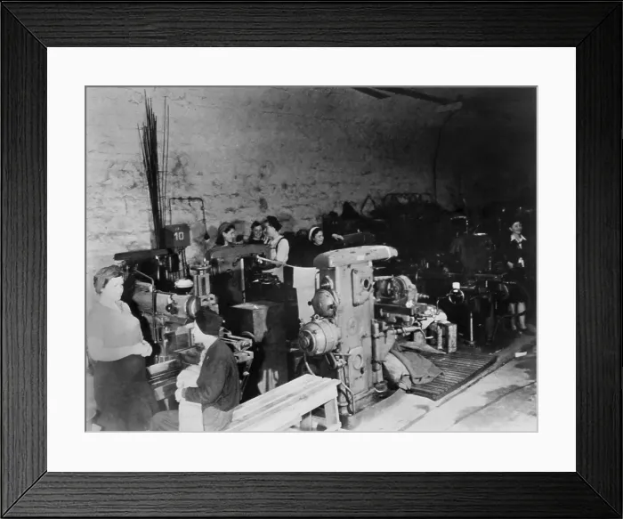 Framed Print : Women working in an underground German armament factory in 1945. It was located in an unused railway tunnel. World War 2. (BSLOC_2014_8_93) Framed Print : Women working in an underground German armament factory in 1945. It was located in an unused railway tunnel. World War 2. (BSLOC_2014_8_93)