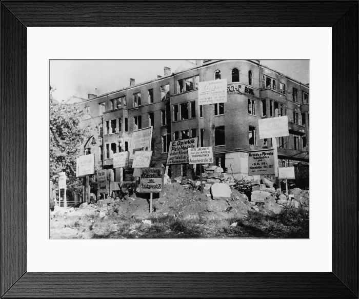 Framed Print : Bombed-out building in Wittenberg Platz, Berlin. Many of the signs posted give directions to merchants new locations Framed Print : Bombed-out building in Wittenberg Platz, Berlin. Many of the signs posted give directions to merchants new locations