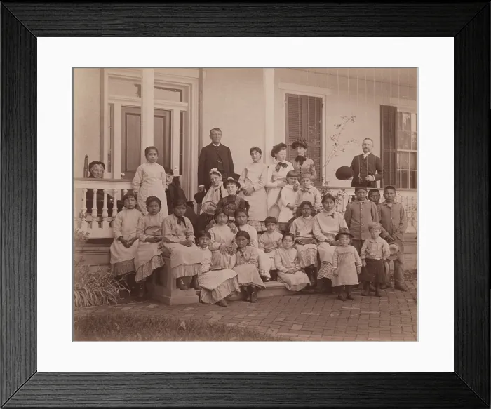 Framed Print : Captain Richard Henry Pratt (standing, left) and students at the Carlisle Indian Industrial School, ca.1890-1900