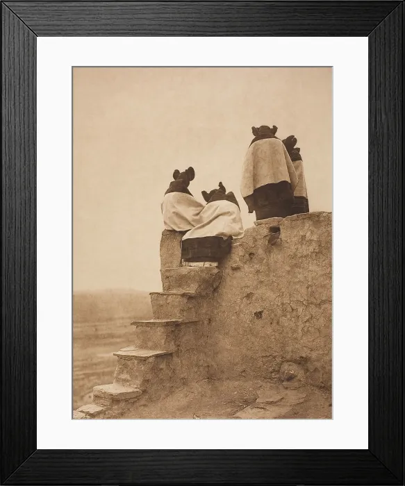 Framed Print : WATCHING THE DANCERS, 1906, photogravure, by Edward Curtis. Four Native American women are on the upper levels of a southwestern pueblo Framed Print : WATCHING THE DANCERS, 1906, photogravure, by Edward Curtis. Four Native American women are on the upper levels of a southwestern pueblo