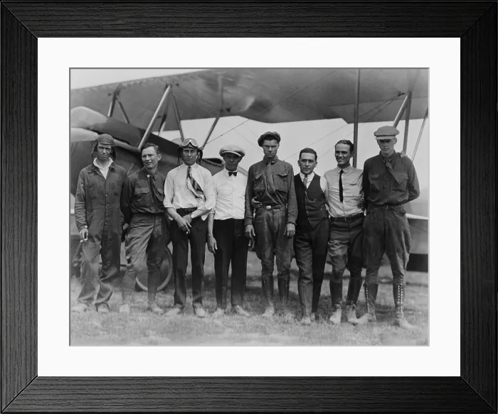 Framed Print : Charles Lindbergh with seven other men, in front of biplane, Lambert-St. Louis Field, 1923