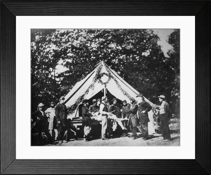 Framed Print : Union Army surgeon performing an amputation in a hospital tent, during or after, the Battle of Gettysburg, July 1863. Fifth from left is the anesthesiologist