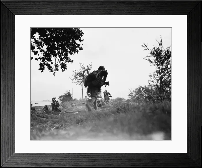 Framed Print : Marines move against the Japanese on Saipan. June 24, 1944. Northern Mariana Islands, World War 2. (BSLOC_2014_10_106)