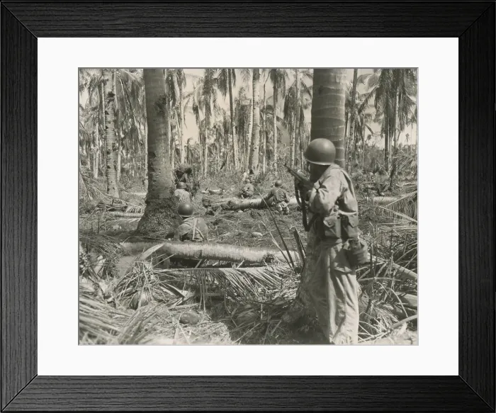 Framed Print : U.S. soldiers pinned down by a enemy machine gun, 50 feet from White Beach, Leyte Island. Oct. 21, 1944. Philippines, Battle of Leyte, World War 2. (BSLOC_2014_10_110)