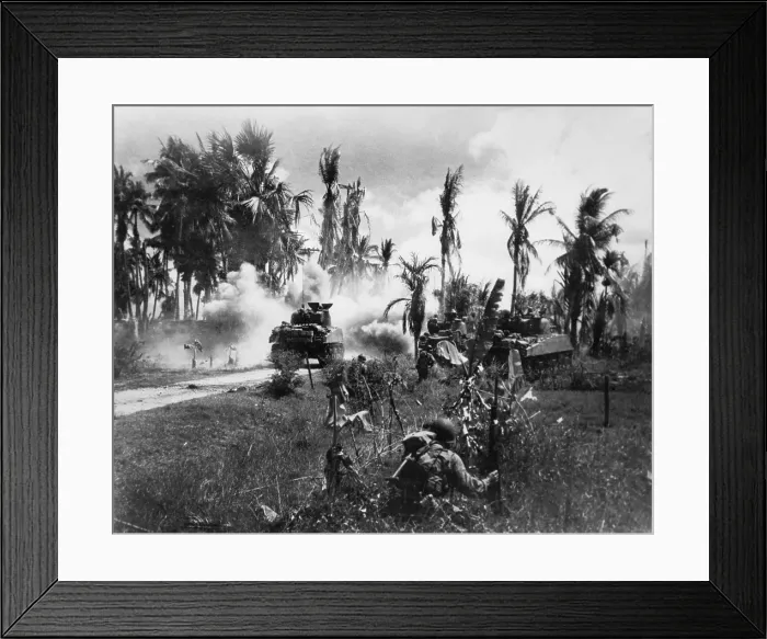 Framed Print : U.S. Troops take cover behind advancing tanks while moving up on Japanese positions. March 18, 1945. Pansy Island, Philippines, World War 2.. (BSLOC_2014_10_111)