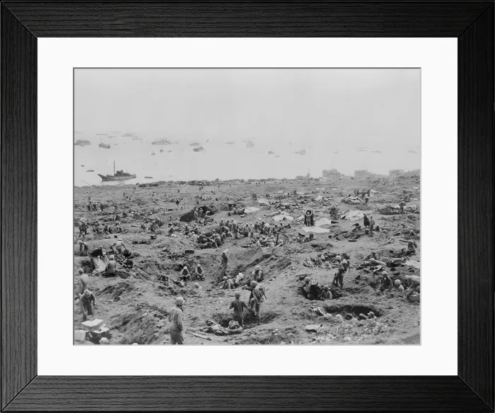 Framed Print : Marines in foxholes on the southeast edge of Motoyama Airfield #1, Iwo Jima. Landing craft are beached on right. February 23, 1945. World War 2. (BSLOC_2014_10_114)