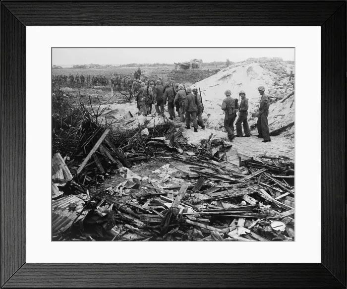 Framed Print : After the first assault cleared Japanese soldiers from the beaches, U.S. Marines advance inland. Roi-Namur Island, Kwajalein Atoll. Feb 1-3, 1944. World War 2. (BSLOC_2014_10_100)