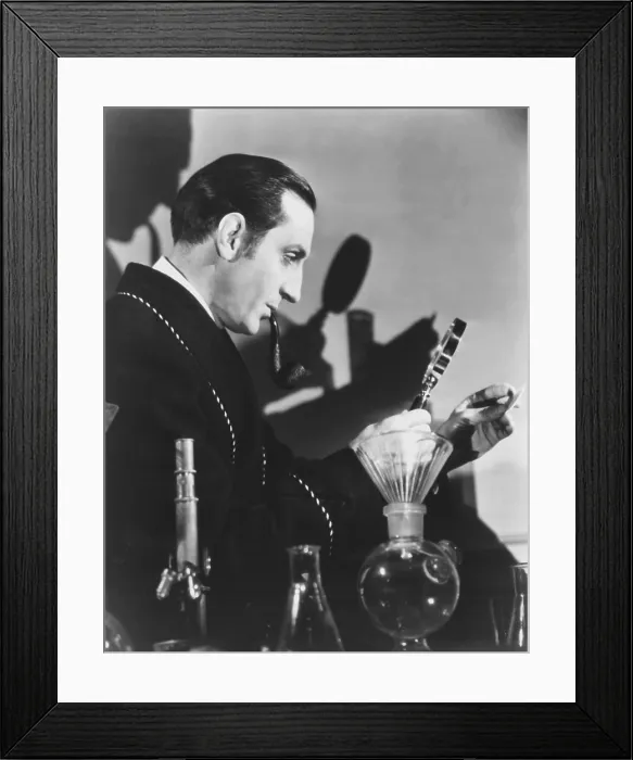 Framed Print : THE HOUND OF THE BASKERVILLES, Basil Rathbone as Sherlock Holmes, 1939, TM & Copyright 20th Century Fox Film Corp. / courtesy Everett Collection