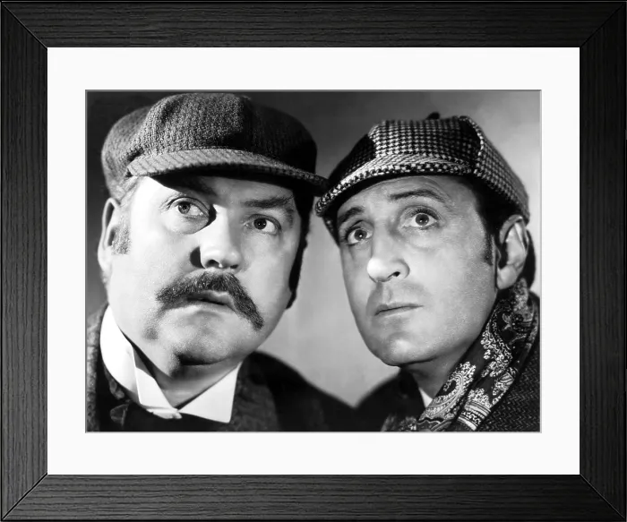 Framed Print : THE HOUND OF THE BASKERVILLES, (l to r): Nigel Bruce & Basil Rathbone, 1939, TM and Copyright 20th Century Fox Film Corp. All rights reserved. / Courtesy Everett Collection