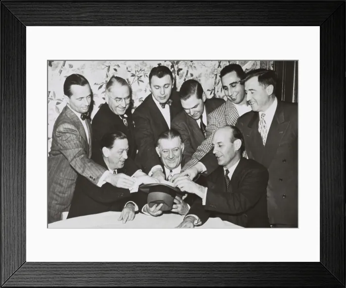 Framed Print : NFL owners gather around Commissioner Bert Bell for the annual bonus draft, Jan. 18, 1951 Framed Print : NFL owners gather around Commissioner Bert Bell for the annual bonus draft, Jan. 18, 1951