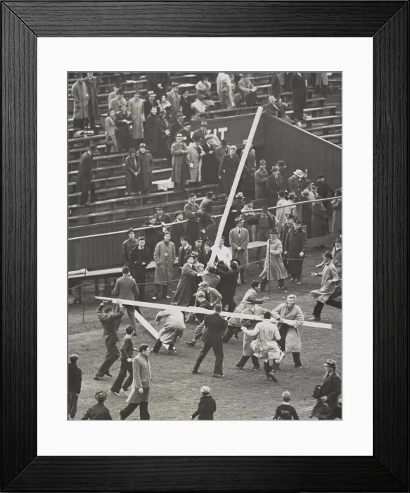 Framed Print : Brown University students tear down the goal posts in celebration of a 7-6 win over Columbia. Oct. 23, 1937. - (BSLOC_2015_1_217)