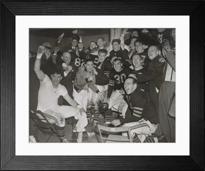 Framed Print : Chicago Bears cheering after beating the Green Bay Packers in the western division playoffs. 2nd from left, standing, is owner-coach George Halas