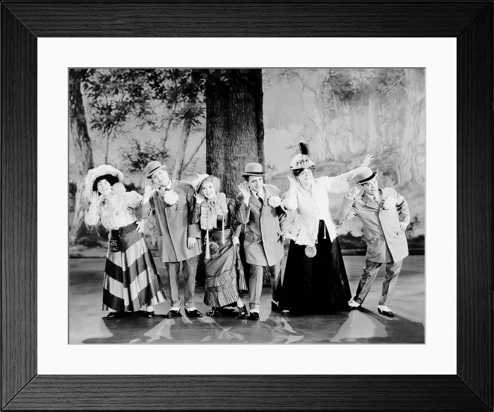Framed Print : HOLLYWOOD REVUE OF 1929, from left, Polly Moran, Charles King, Bessie Love, Gus Edwards, Marie Dressler, Cliff Edwards, 1929