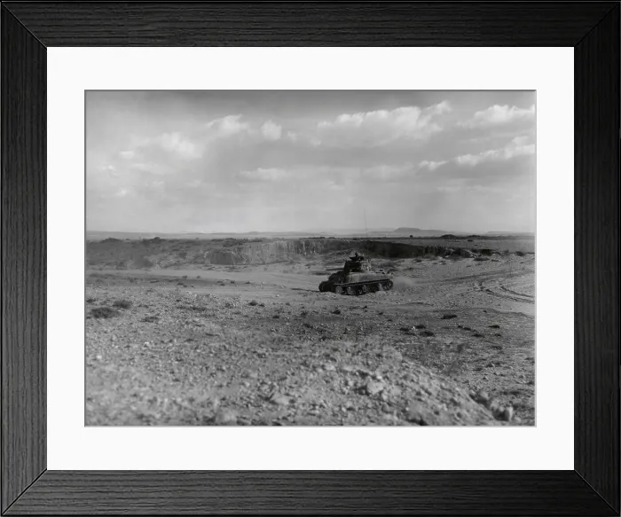 Framed Print : U.S. Army tank in Sidi Bou Zid, North Africa, shortly before the German advance of Feb. 14, 1943. 46 U.S. Sherman Tanks were destroyed in the Battle of Didi Bou Zid. Tunisia