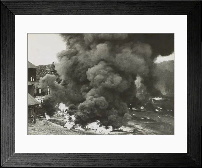 Framed Print : Smoke rises from a rubber factory destroyed by the retreating British forces in Malaya Framed Print : Smoke rises from a rubber factory destroyed by the retreating British forces in Malaya