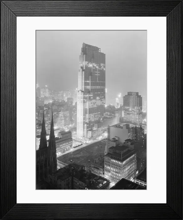 Framed Print : Night view of Rockefeller Center and RCA Building from 515 Madison Avenue on Dec. 5, 1933. The lots across the Street from St