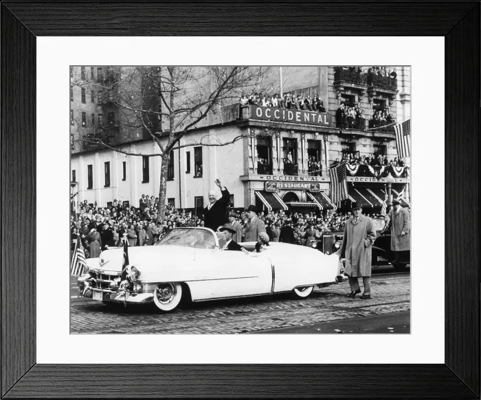 Framed Print : Newly inaugurated President Dwight Eisenhower waves to crowds from an open car