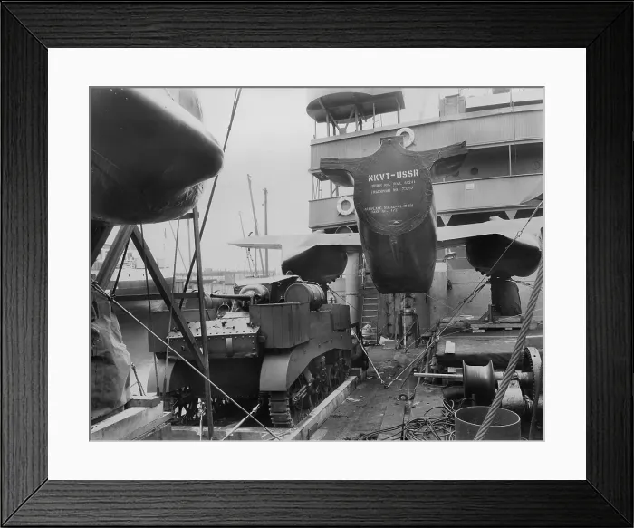 Framed Print : Lend Lease shipment loaded onto a ship bound for the Soviet Union. An airplane is shipped in sections to be joined in the USSR. Ca. 1941-1943. World War 2. (BSLOC_2014_10_153)