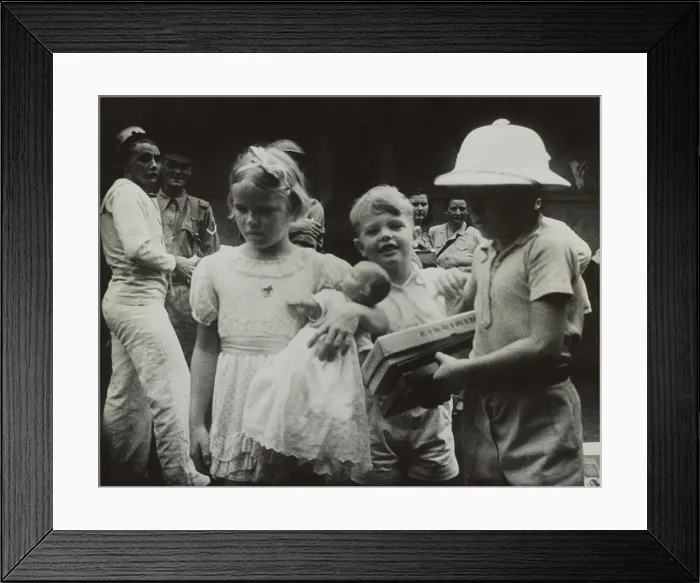 Framed Print : Children clutching their toys as they evacuate from Singapore before the arrival of the Japanese. Ca. Feb. 1942. World War 2. (BSLOC_2014_10_143) Framed Print : Children clutching their toys as they evacuate from Singapore before the arrival of the Japanese. Ca. Feb. 1942. World War 2. (BSLOC_2014_10_143)