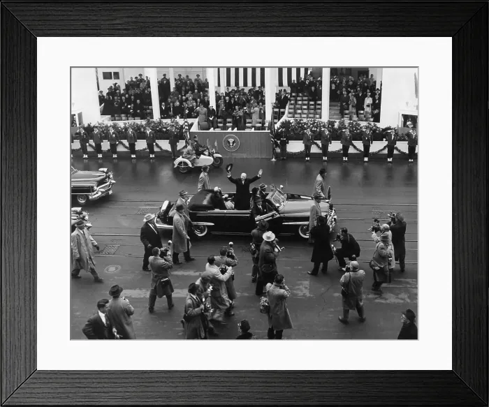 Framed Print : Eisenhower waves from an open car in the inaugural parade. Behind him is the White House Inaugural pavilion. Jan. 21, 1957. - (BSLOC_2014_16_36)