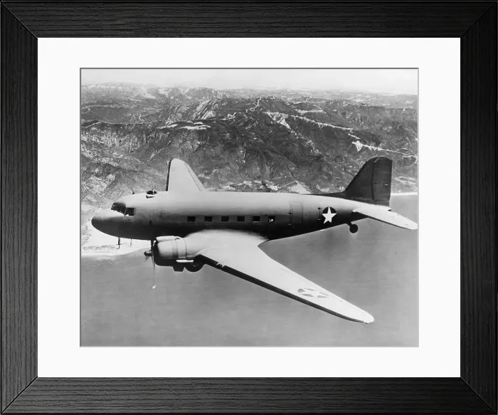 Framed Print : Douglas C-47 Skytrain in flight. The transport was used in in World War 2 and the Korean War. It was also developed as the civilian Douglas DC-3 airliner. Ca. 1942-45 Framed Print : Douglas C-47 Skytrain in flight. The transport was used in in World War 2 and the Korean War. It was also developed as the civilian Douglas DC-3 airliner. Ca. 1942-45