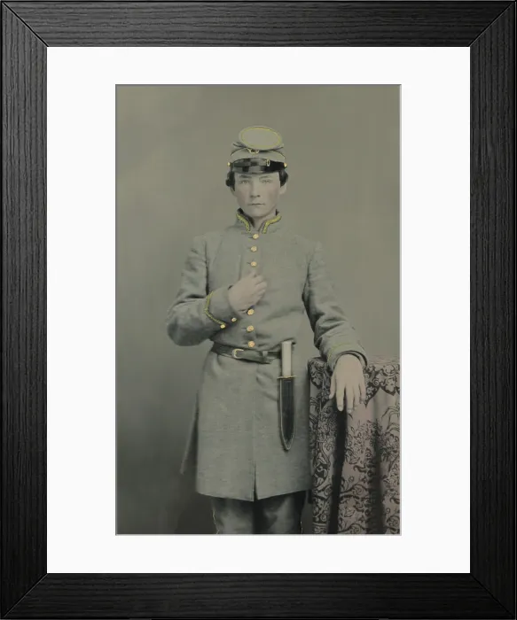 Framed Print : Teenage Confederate soldier in uniform with a Bowie knife on his belt, c. 1861-65. In February 1864, 17 year old boys were conscripted into the army