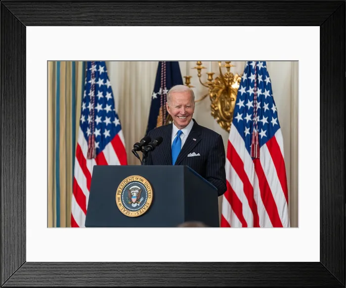Framed Print : President Joe Biden speaks at the signing ceremony of the Postal Service Reform Act, April 6, 2022, in the State Dining Room of the White House